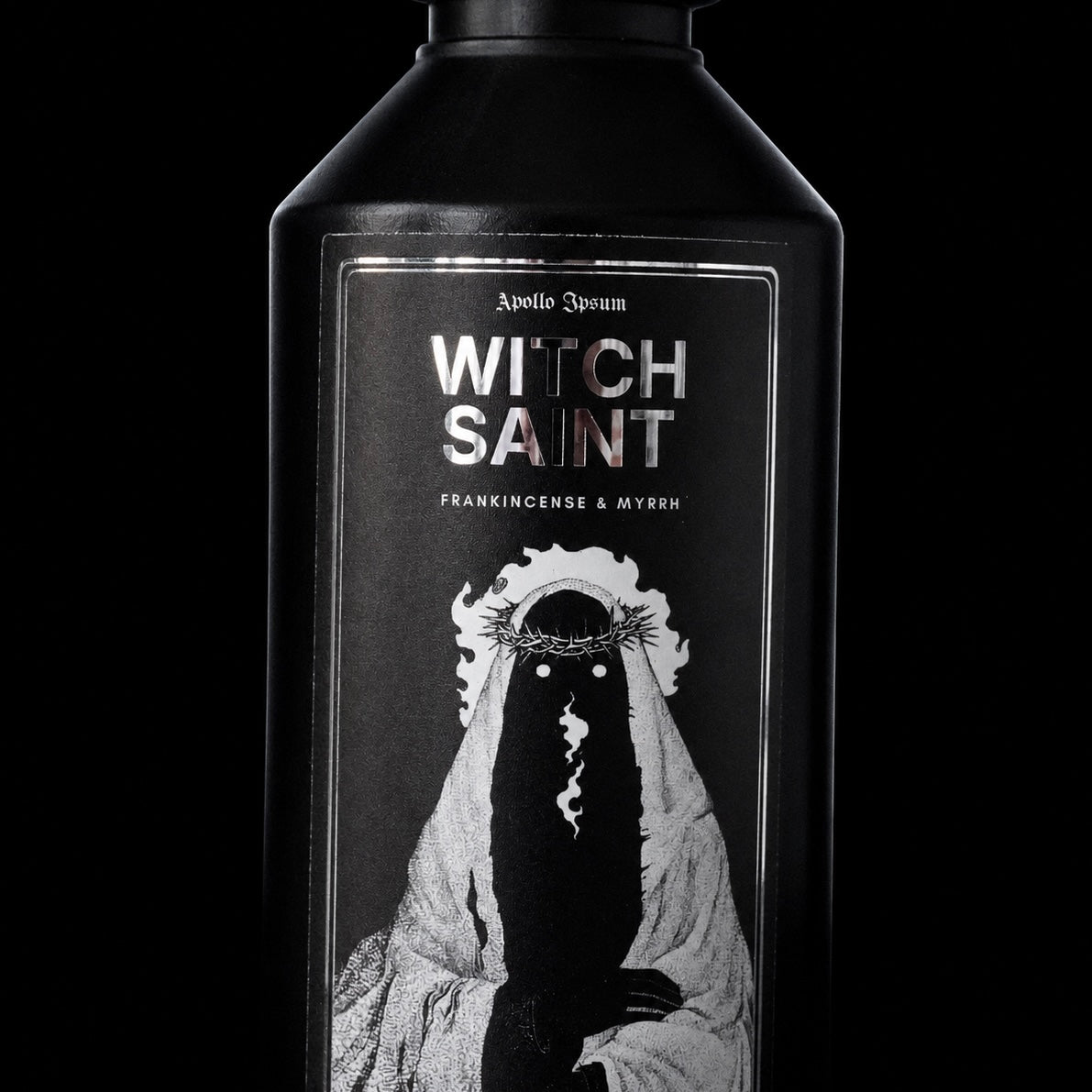 Close-up of the Witch Saint Fabric Perfume label on a frankincense home fragrance spray