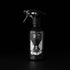 Happy Spell 250ml linen and fabric spray by Apollo Ipsum on a black studio background