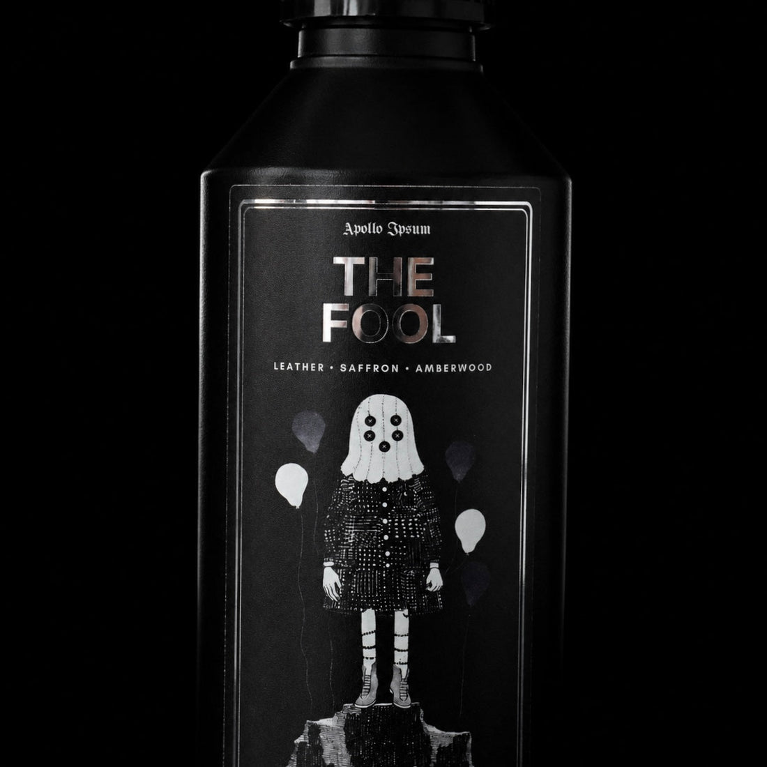 Close-up of The Fool Fabric Perfume label on a spiced home fragrance spray