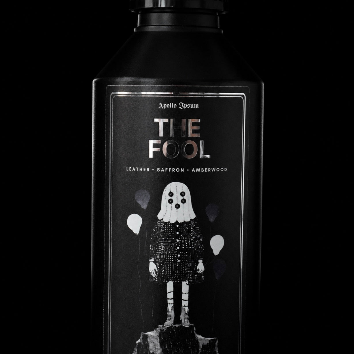 Close-up of The Fool Fabric Perfume label on a spiced home fragrance spray